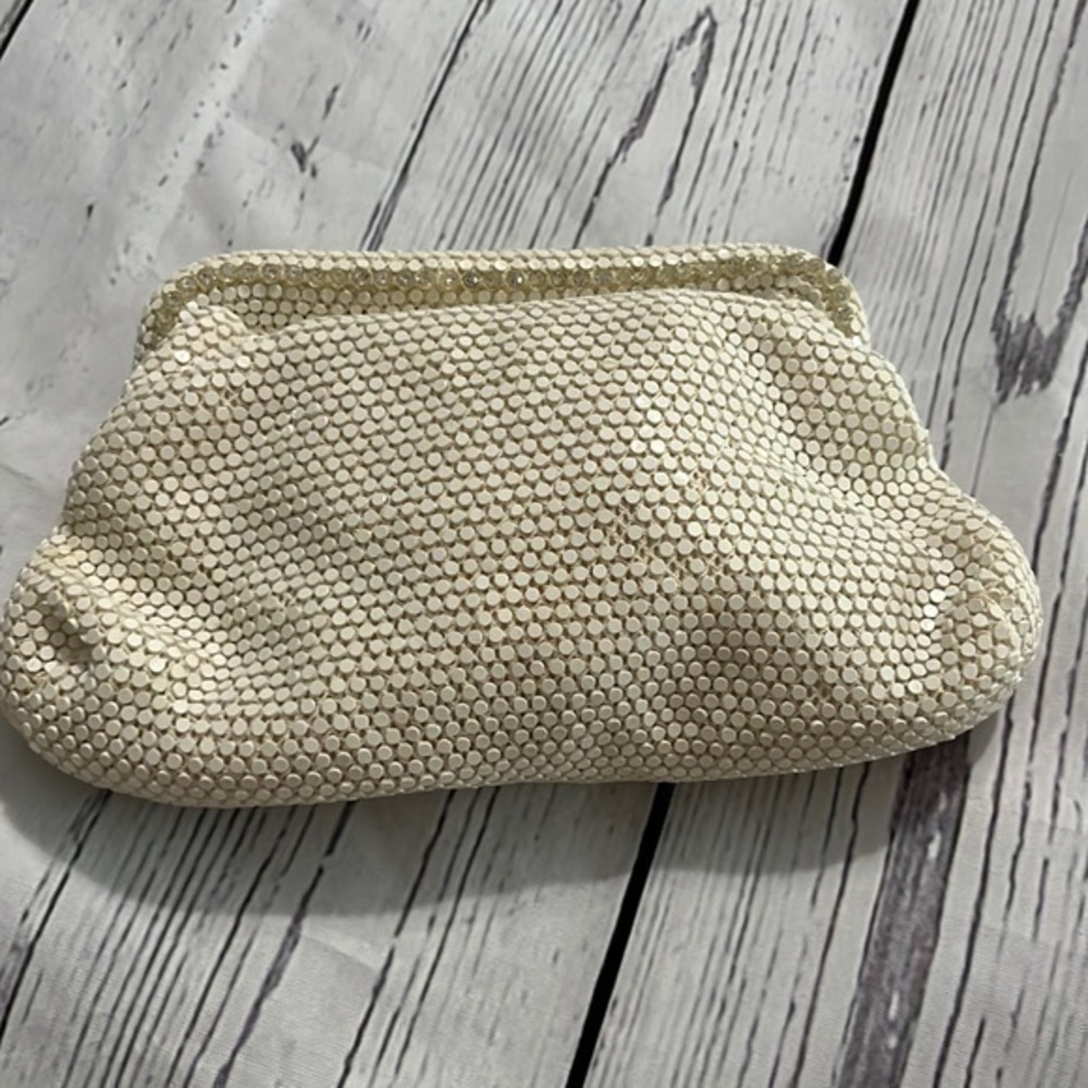 Dainty special occasion clutch with snap hinge closure cream